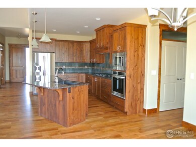 Kitchen with Knotty Alder Cabinets