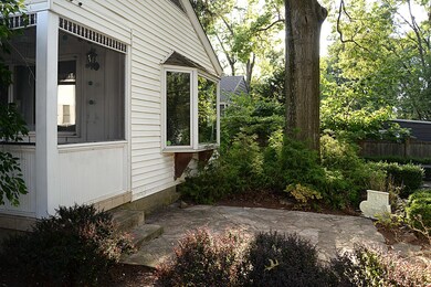 back bay window and stone patio