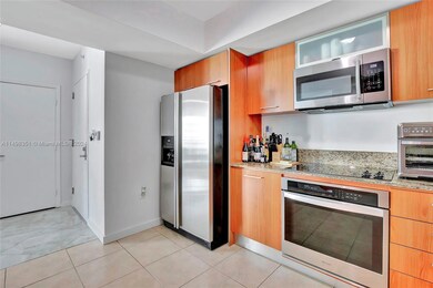 The kitchen boasts stainless steel appliances.  The range and washer & drying are only 2 years old.
