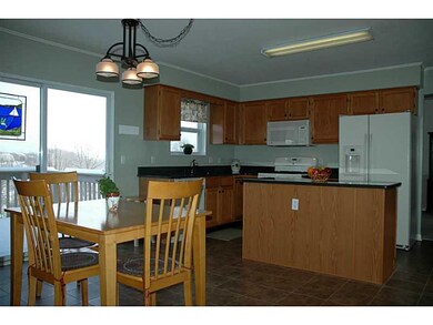 Cafeteria/Kitchen. Large eat in kitchen with slidi