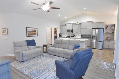 Living room featuring light hardwood / wood-style 
