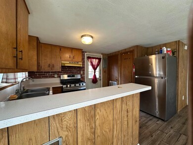 116 Chases Grove Rd, Derry, NH 03038 - photo 4