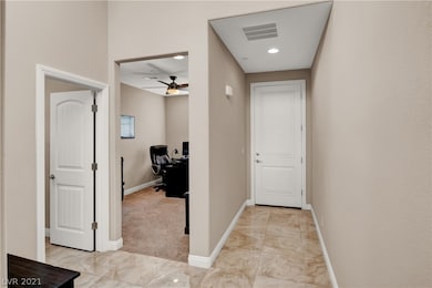 Entryway looking into the den