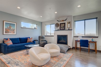 Living room featuring hardwood / wood-style floori