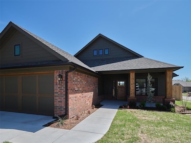 View of front of home featuring covered porch, an 