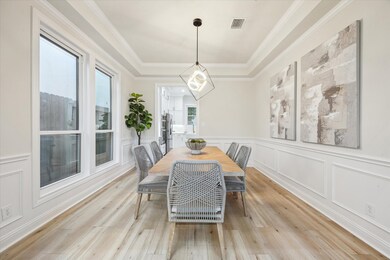 [DINING ROOM]  The dining room exudes elegance wit