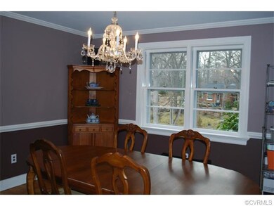 Dining Room features crown and chair rail moulding