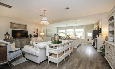Walk to your living area that is open to the dinin