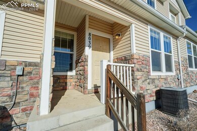 Entrance to property with central AC unit