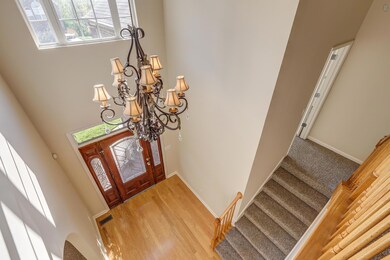 Inviting Entry Way With Hardwood Floors 