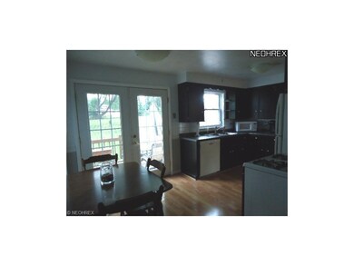 View of the Kitchen showing french doors that lead
