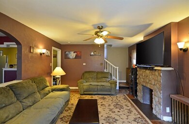 The front entry opens into the spacious living roo