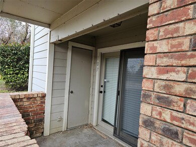 Property entrance with brick siding