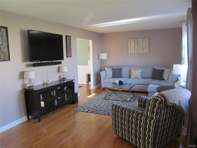 BRIGHT LIVING ROOM, COLORS ARE NEUTRAL THROUGHOUT