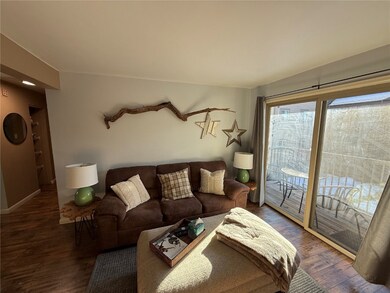 Living room featuring dark hardwood / wood-style f