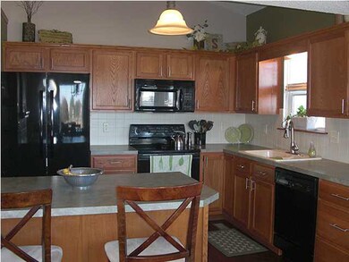 Kitchen and breakfast bar