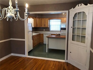 View into the kitchen from the dining room.  Notic