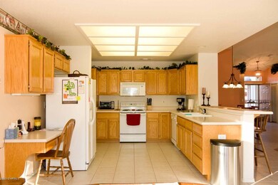 Kitchen with tile flooring.