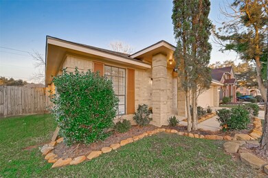 Lush landscaping across the front of the home