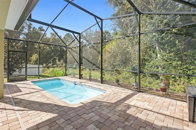 Pool Patio Area.  Private wooded view.