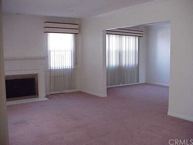 Another view of the living room looking into the formal dining room