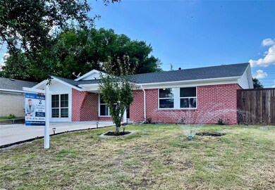 View of front of property with a front yard