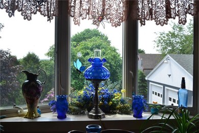 Bow window overlooking the back yard.