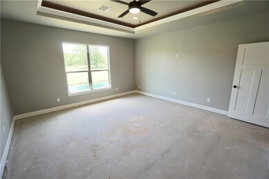 HERE WE ENTER INTO THE MASTER BEDROOM.  ONE CAN CHOOSE THE FLOORING WITHIN THE BUILDERS ALLOWANCE.  ANOTHER SNEAK PEAK AT THE WATER AND WOODS.