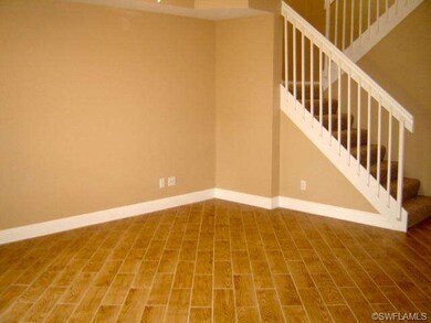 Wood-like tile floor in Living Room