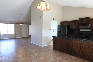 Dining open to great room and kitchen