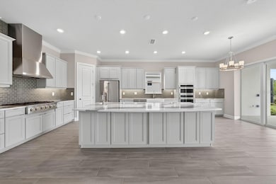 IMPECCABLE KITCHEN! Monogram appliances, prep sink, farmhouse sink, beverage fridge and more..