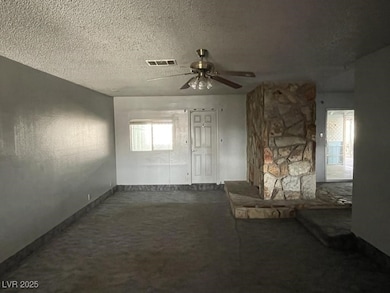 Unfurnished living room featuring carpet, ceiling