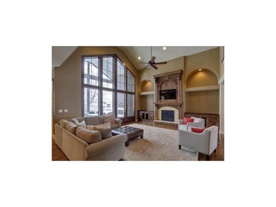 Sophisticated Great Room with Fireplace and built 
