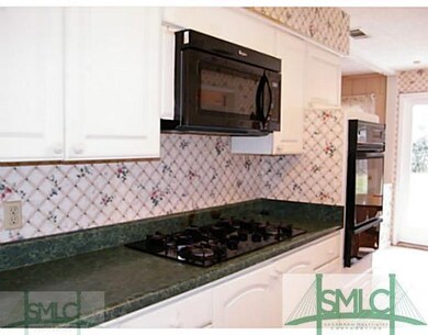 Kitchen. 5 Burner Gas Stove and New Microwave