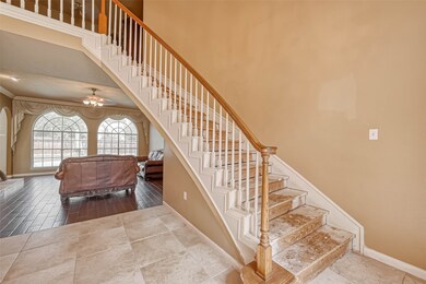 What a beautiful sweeping staircase - just needs some TLC