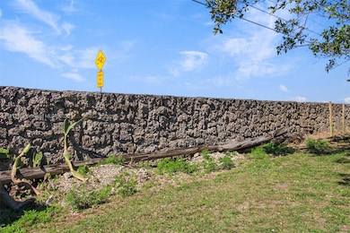 6 feet high thick wall on 147 ave., Westside