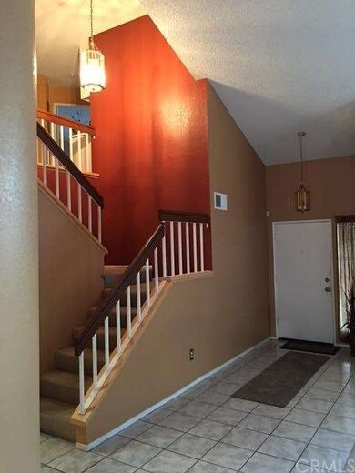 entry and stair leading to second level 