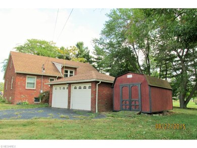 2 car attached (via breezeway) garage with openers
