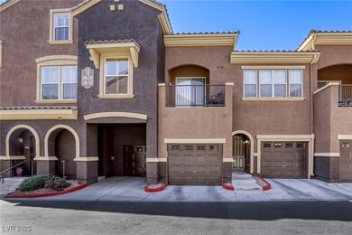 View of property featuring a balcony, stucco sidin