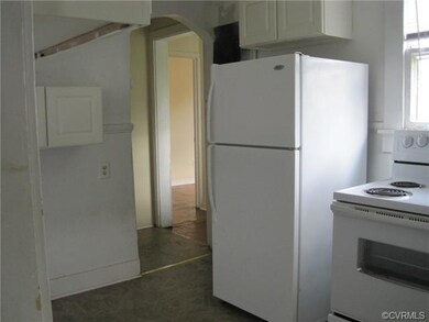 Kitchen, looking towards back bedroom.