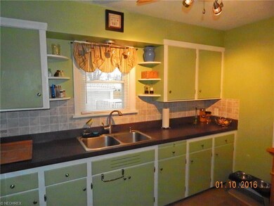 Updated Kitchen With New Counter Tops, Back Splash And Flooring