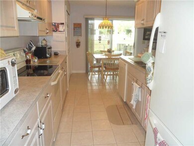 Kitchen. The kitchen features pull out shelves in