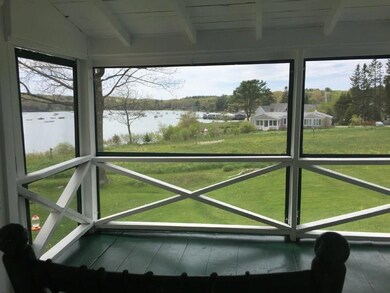 Screened in porch overlooking Harbor