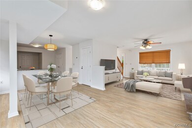 Dining space with light wood-type flooring and ceiling fan