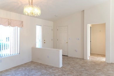 Entryway to an open Living room and dining room.
