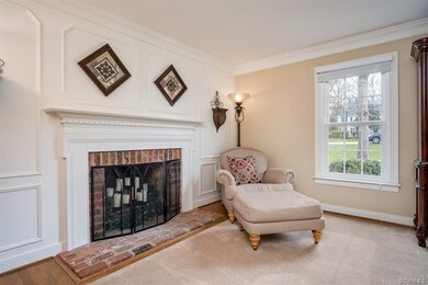 Brick wood burning fireplace with picture and dent