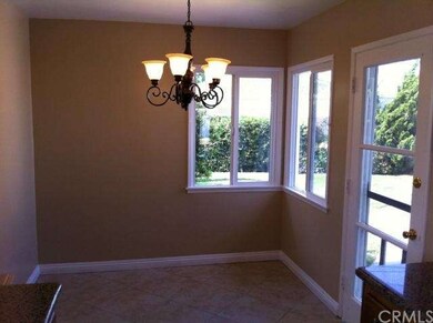 BREAKFAST NOOK OVERLOOKS PRIVATE BACKYARD