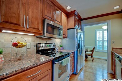 Kitchen with granite counter tops.