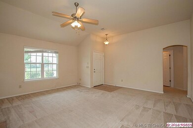 Entry opens to spacious living area & hallway