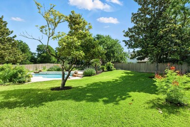 View of fenced backyard
